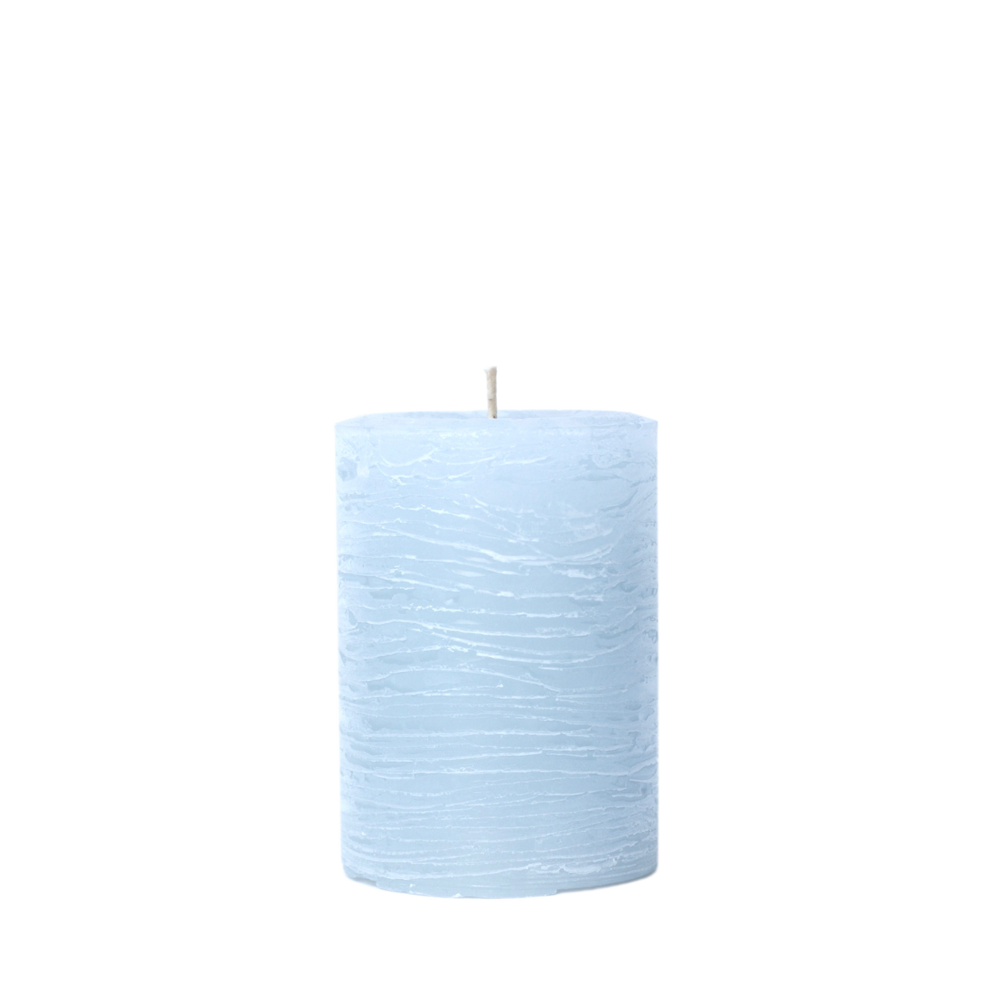 A minimalist Nordic-style pillar candle in a solid ice blue, featuring horizontal textured lines and a handcrafted rustic finish.