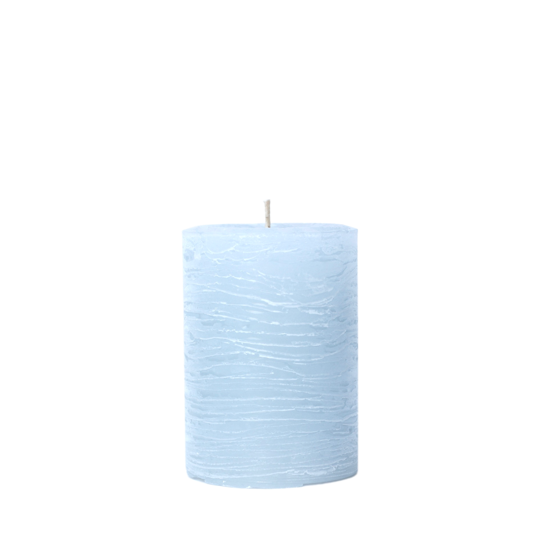 A minimalist Nordic-style pillar candle in a solid ice blue, featuring horizontal textured lines and a handcrafted rustic finish.