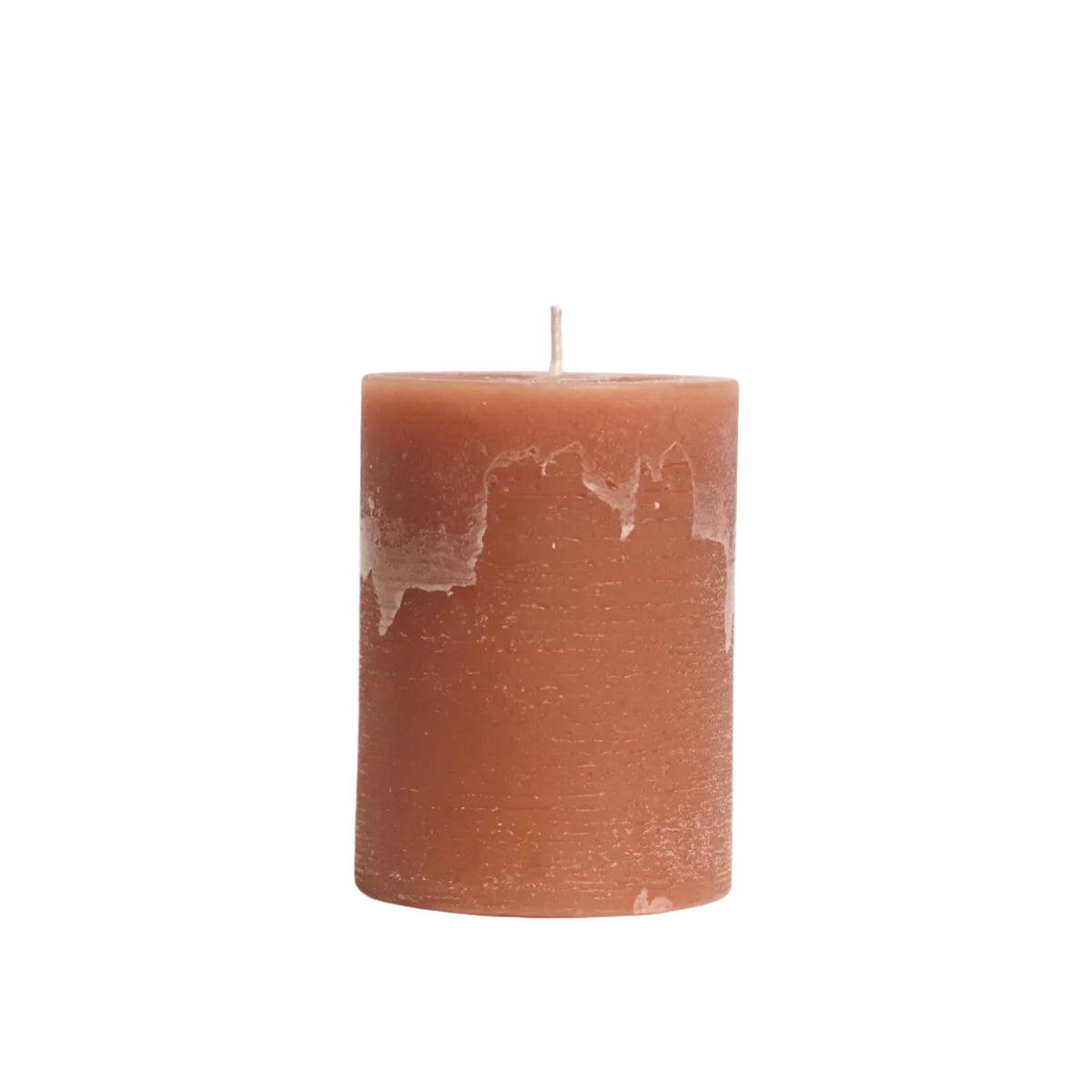 A single brown cylindrical candle with a textured, wax-like surface and a small wick at the top, standing upright against a plain white background.