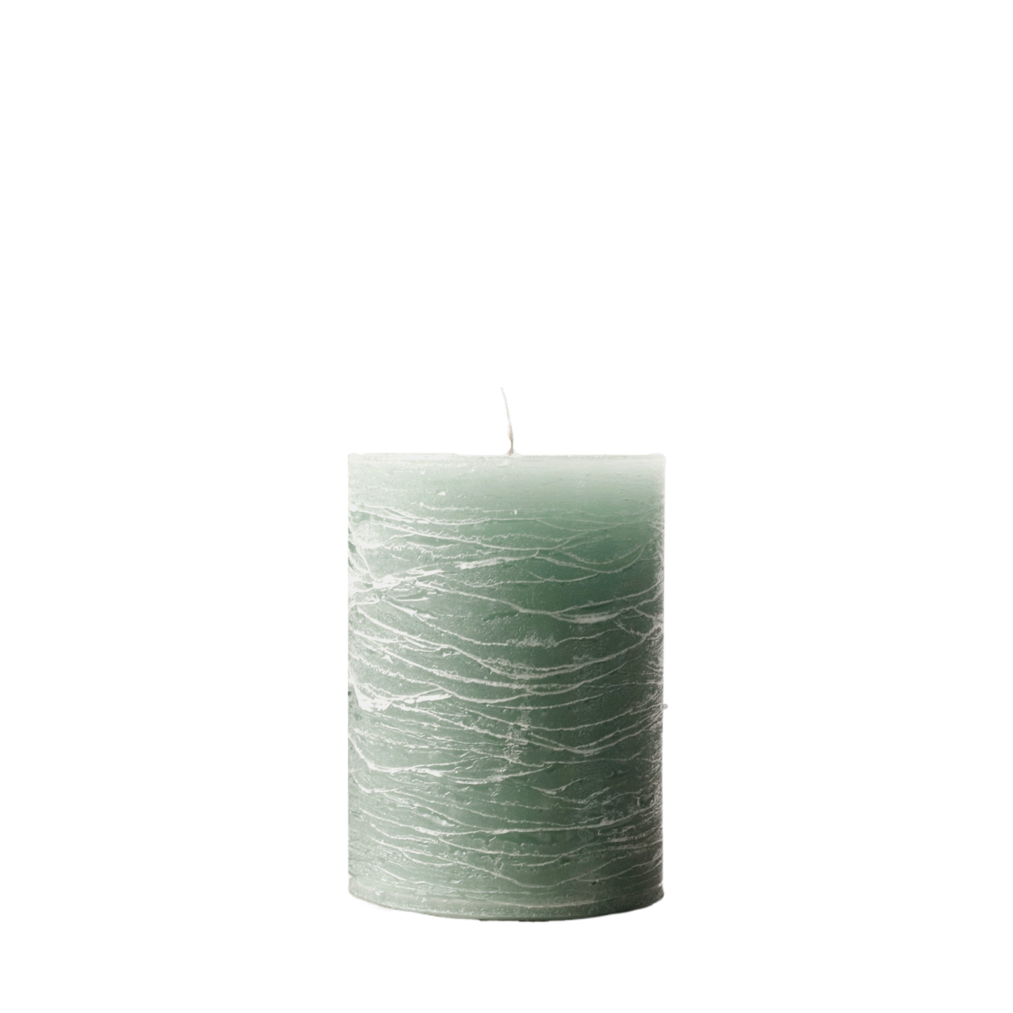 A minimalist Nordic-style pillar candle in a solid muted sage green, featuring horizontal textured lines and a handcrafted rustic finish.