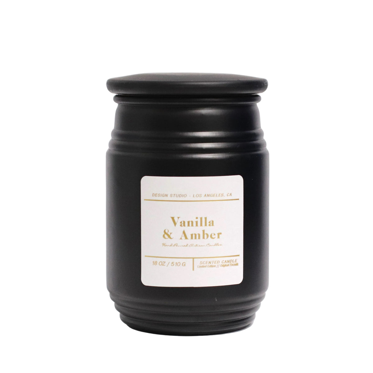 Scented Vanilla & Amber container candle in a solid blackglass jar with black lid