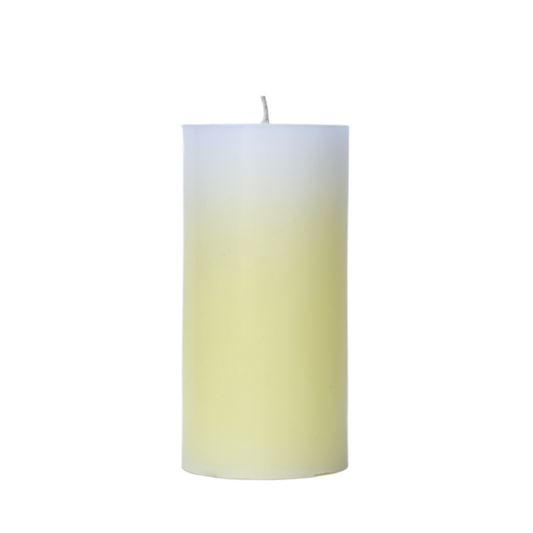 A 6-inch tall pillar candle featuring a smooth color gradient that fades from a crisp white top to a yellow base.